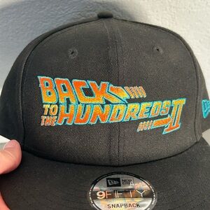 New Era Black Snapback Hat with White Logo